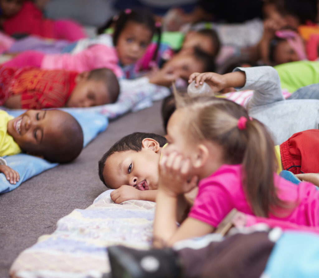 nap-time-preschool-children-all-lying-down