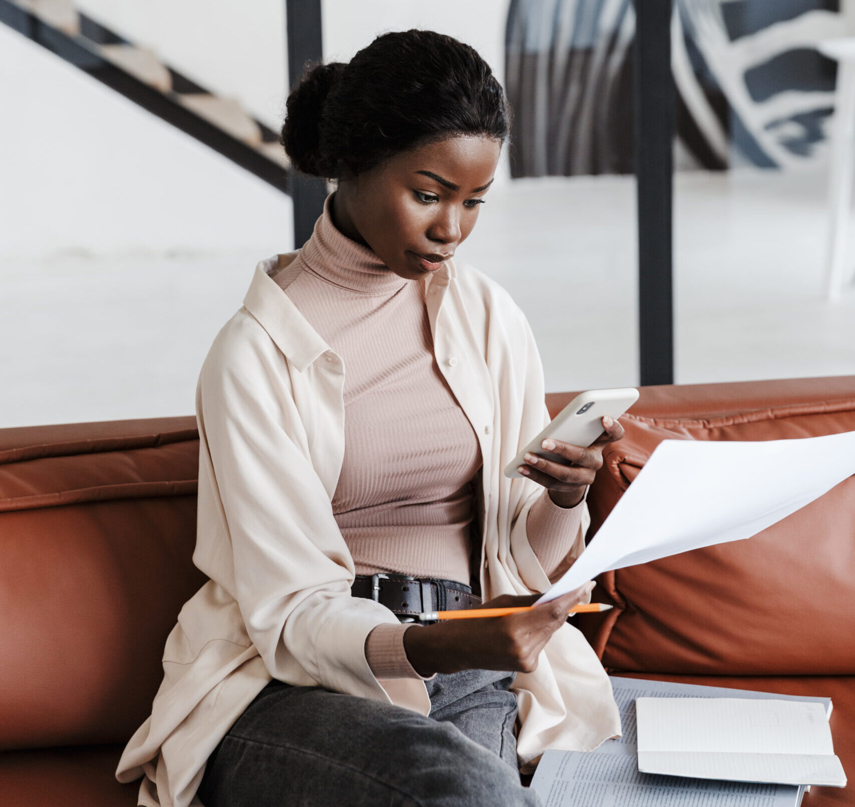 Business professional reviewing partnership documents in a calm, focused setting