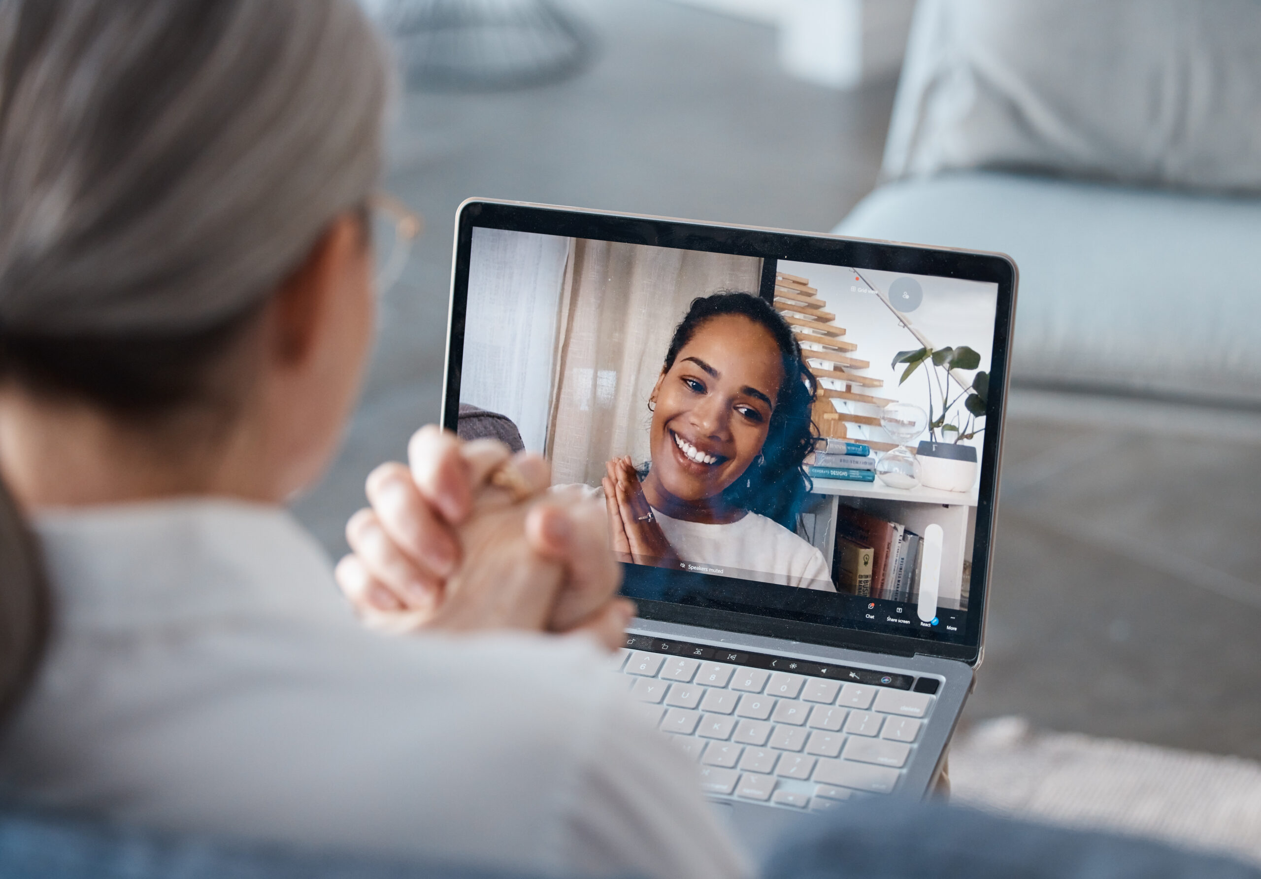 Women engaged in a virtual video call, connected and attentive
