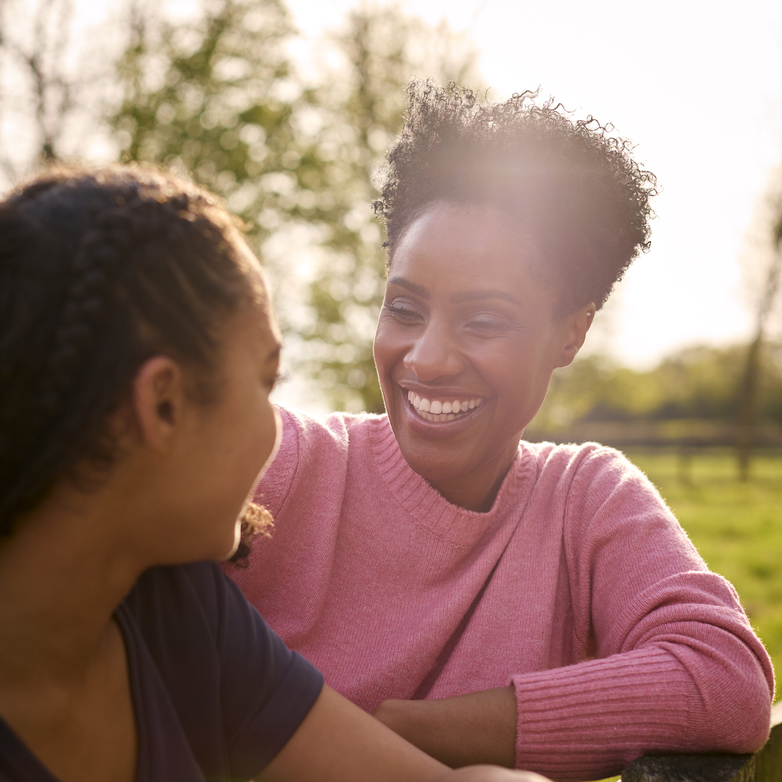 Two women in an honest, open conversation — warm and natural connection