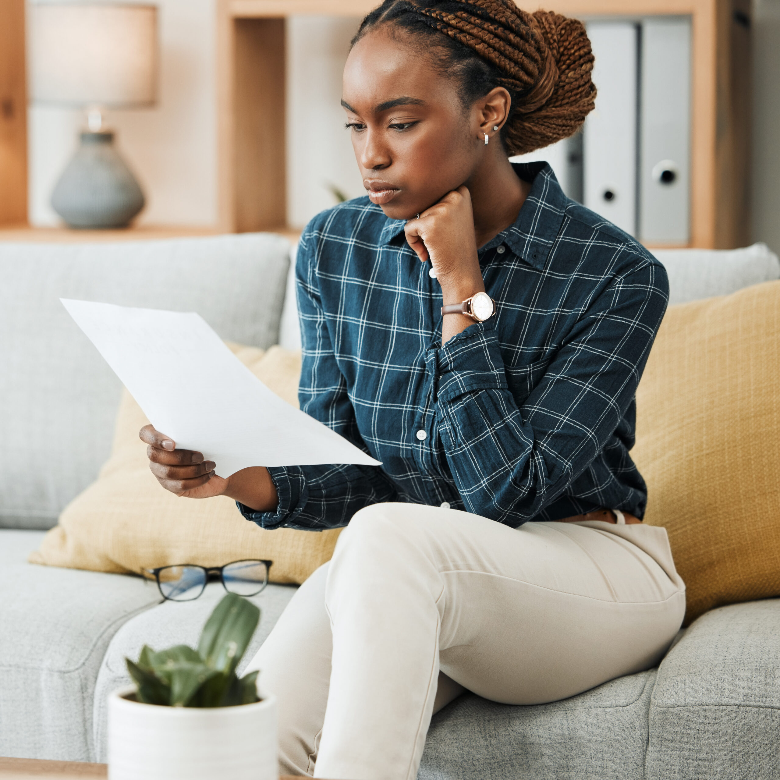 Woman calmly reviewing documents — focused and prepared